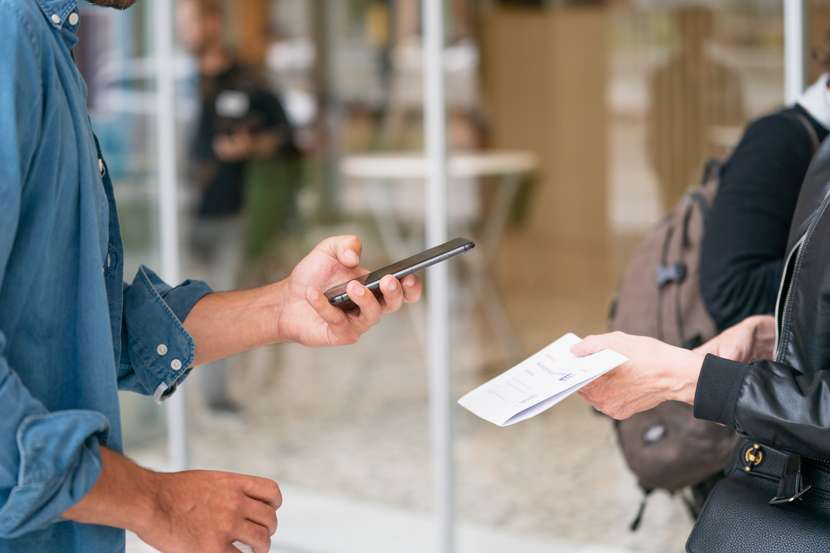 person scans an sku code to check availability in the warehouse